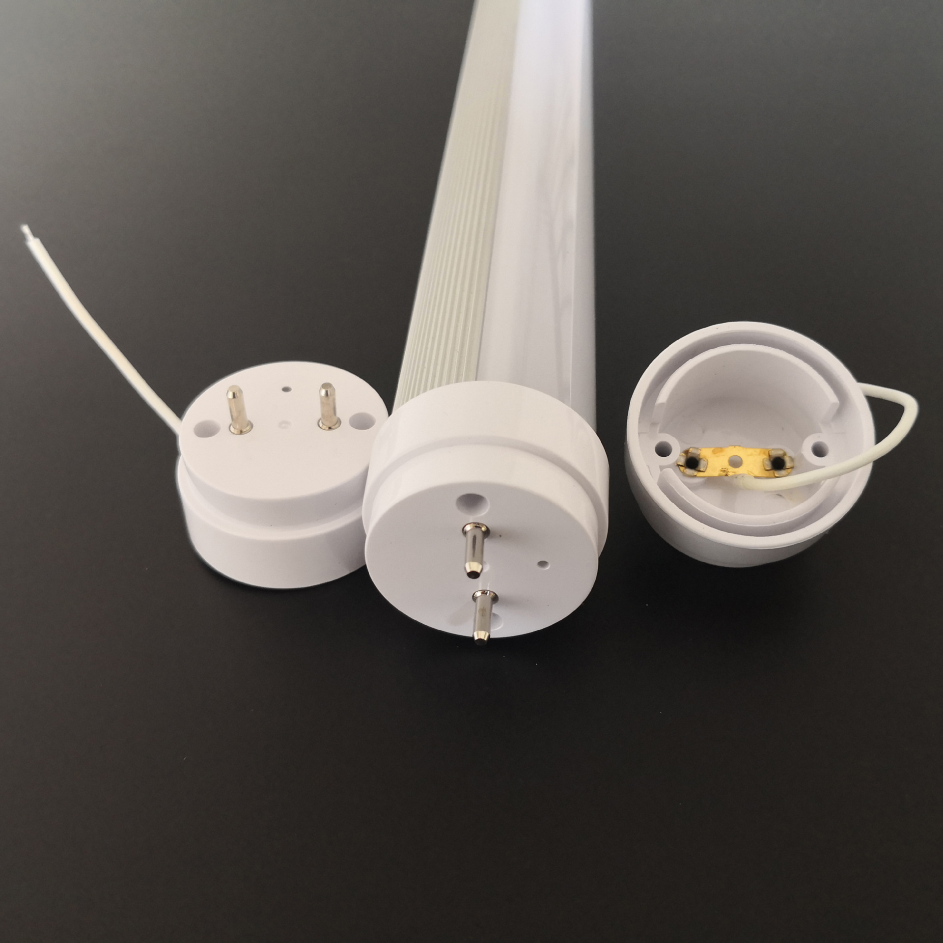 Why do LED tube diffusers have black spots?